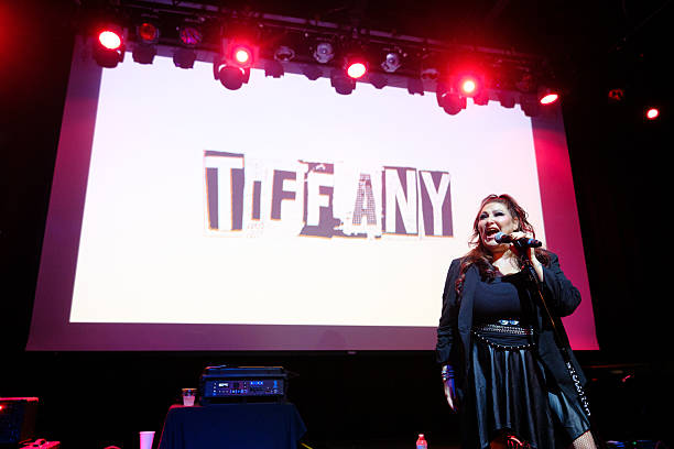 Tiffany performing live on stage at WORKPLAY in Birmingham, Alabama during her All This Time Tour on April 15, 2026